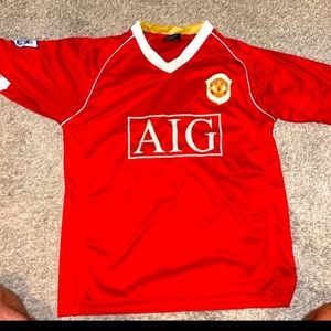 Manchester United M jersey, Barclays, AIG.